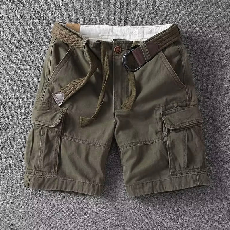 Black men's casual cargo shorts designed for utility with numerous pockets, ideal for outdoor adventures.