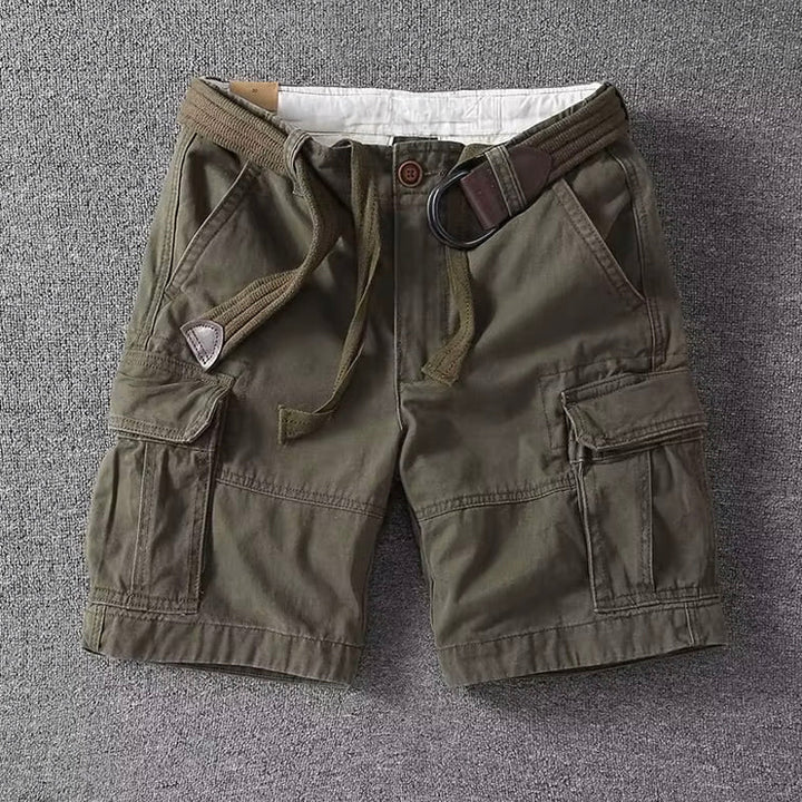 Black men's casual cargo shorts designed for utility with numerous pockets, ideal for outdoor adventures.