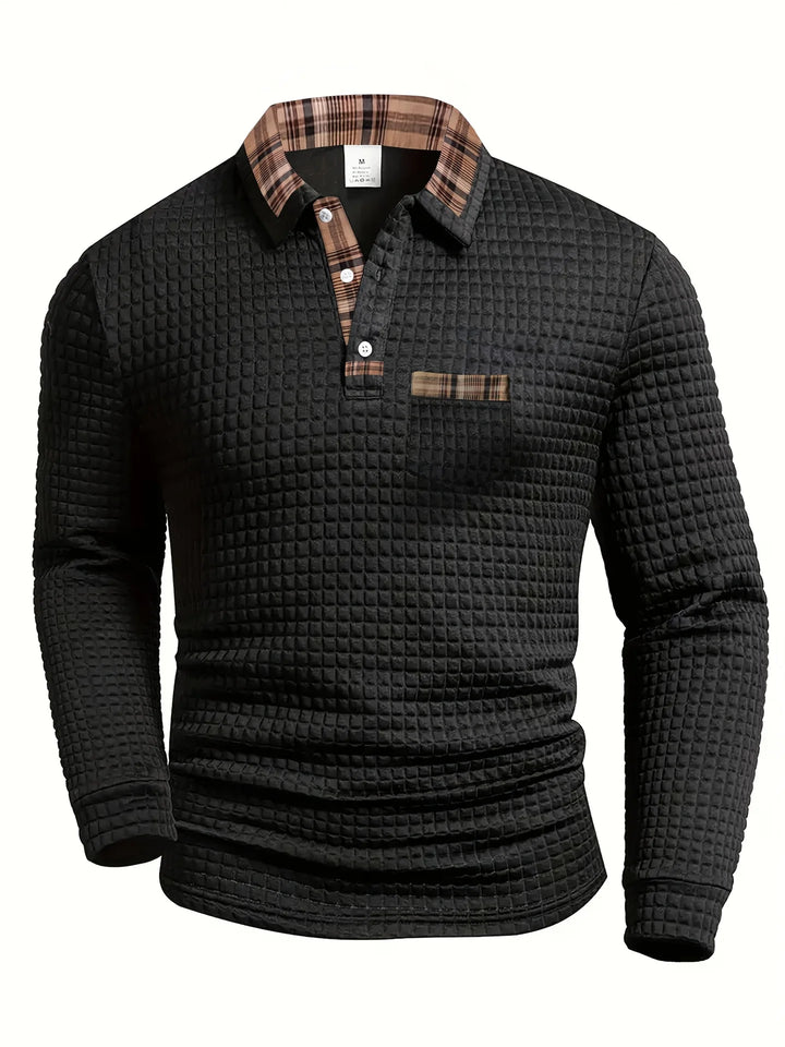 Close-up of the fabric on a men's classic checked long-sleeve polo shirt, showing texture
