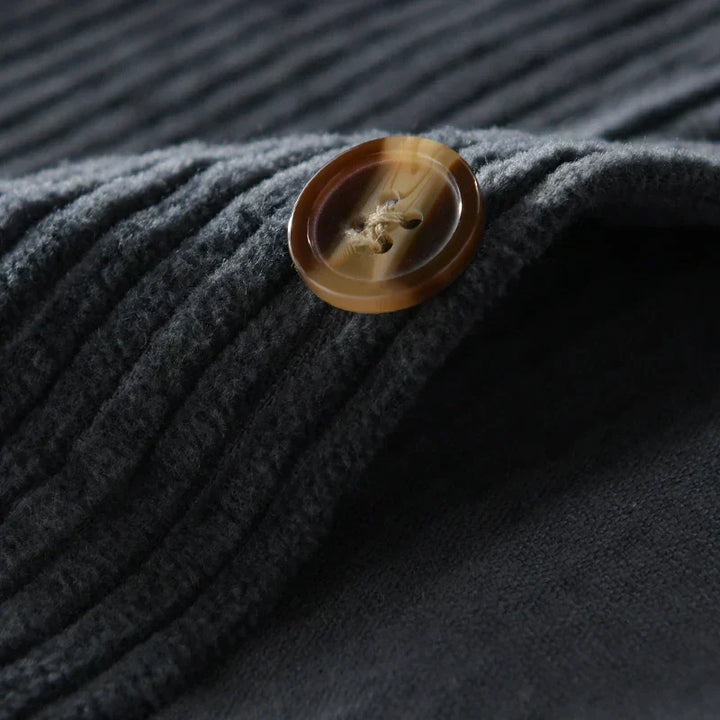 Stylish men's long-sleeve corduroy shirt, designed for comfort with a classic ribbed texture and versatile appeal.