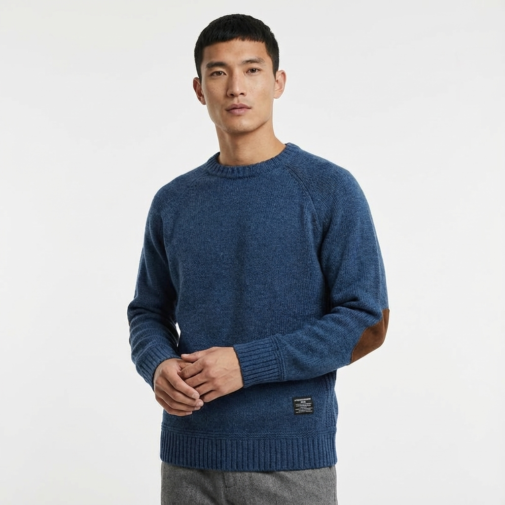 Menswear crew neck jumper, featuring elegant elbow patches, great for a fall smart casual outfit.