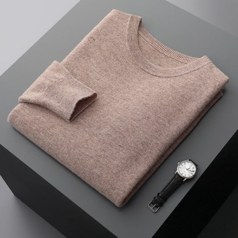 Detail of the ribbed cuffs and hem on a men's long sleeve classic pullover sweater.