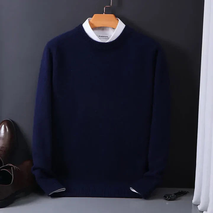 Stylish man wearing a gray classic wool-blend pullover sweater, perfect for winter fashion.