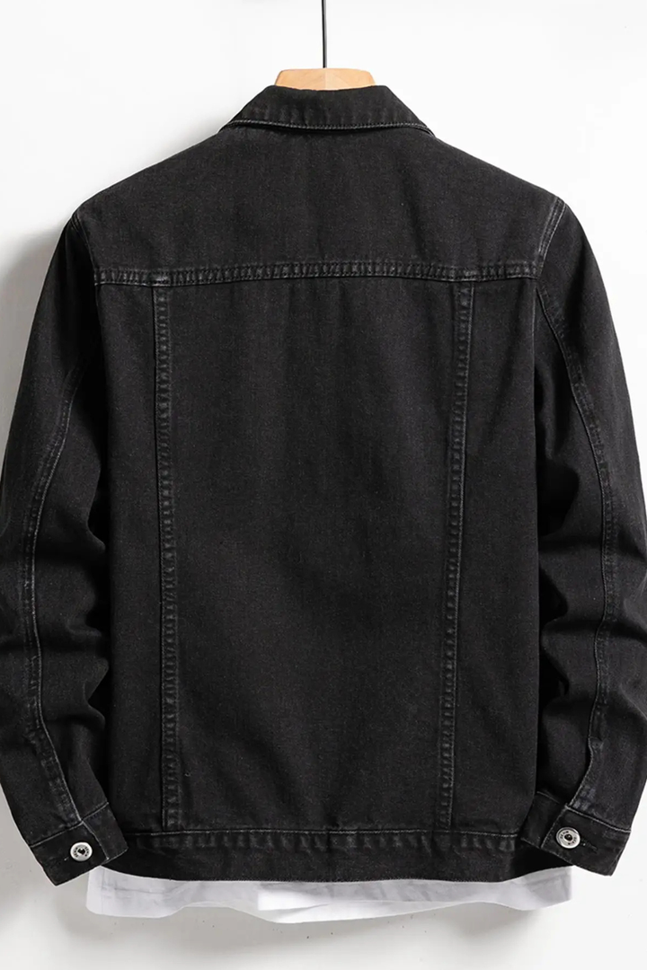 Stylish men's black denim jacket, classic fit button-up design. A versatile layering piece for casual everyday wear.