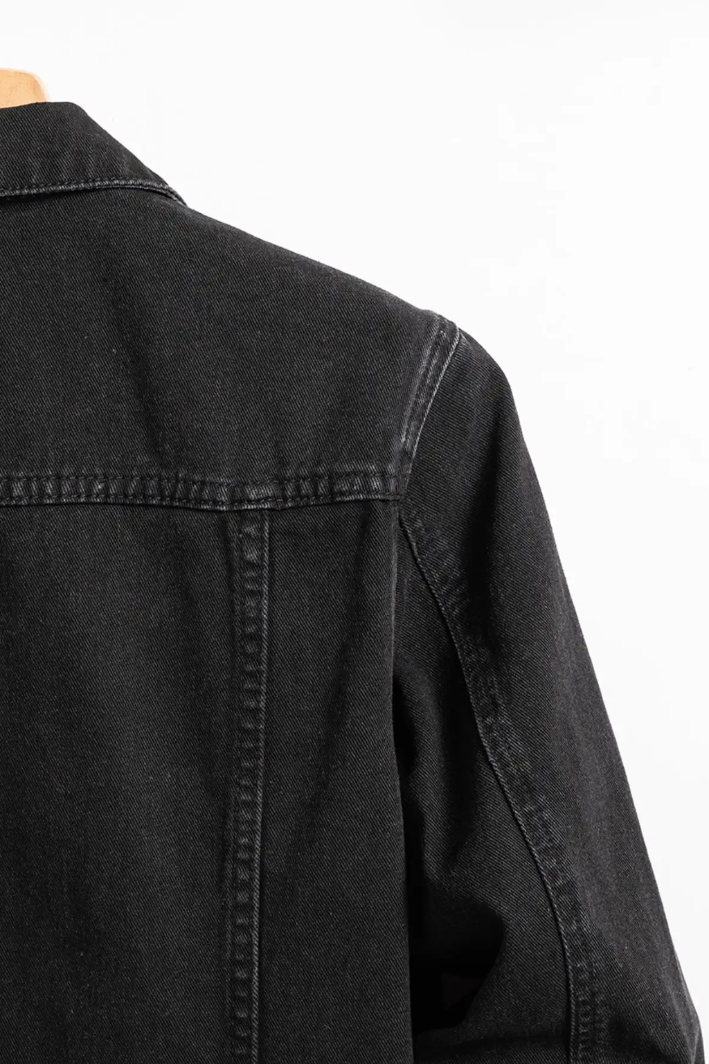 Men's black denim jacket with a classic fit. Button-up, perfect as versatile casual outerwear and a layering piece.