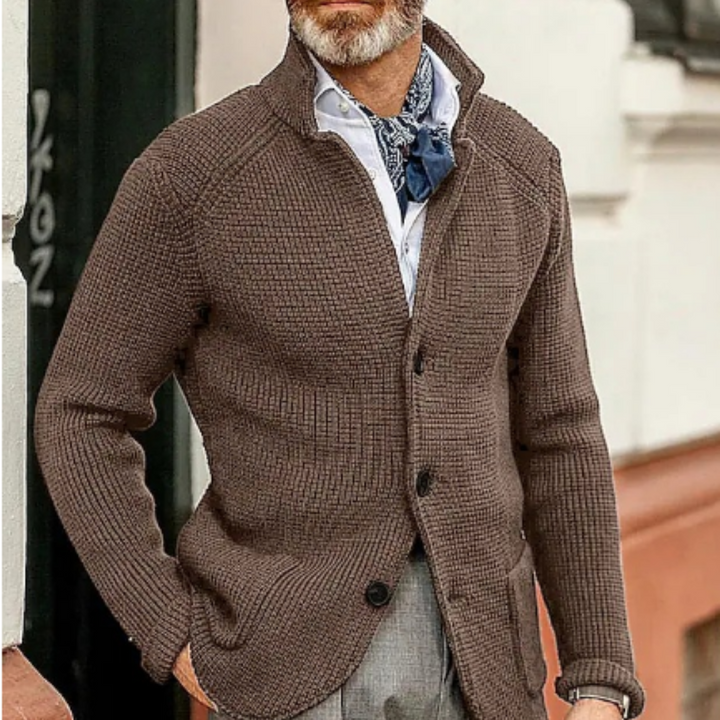 Close-up of the cozy collar and button details of a warm men's knit cardigan for layering.