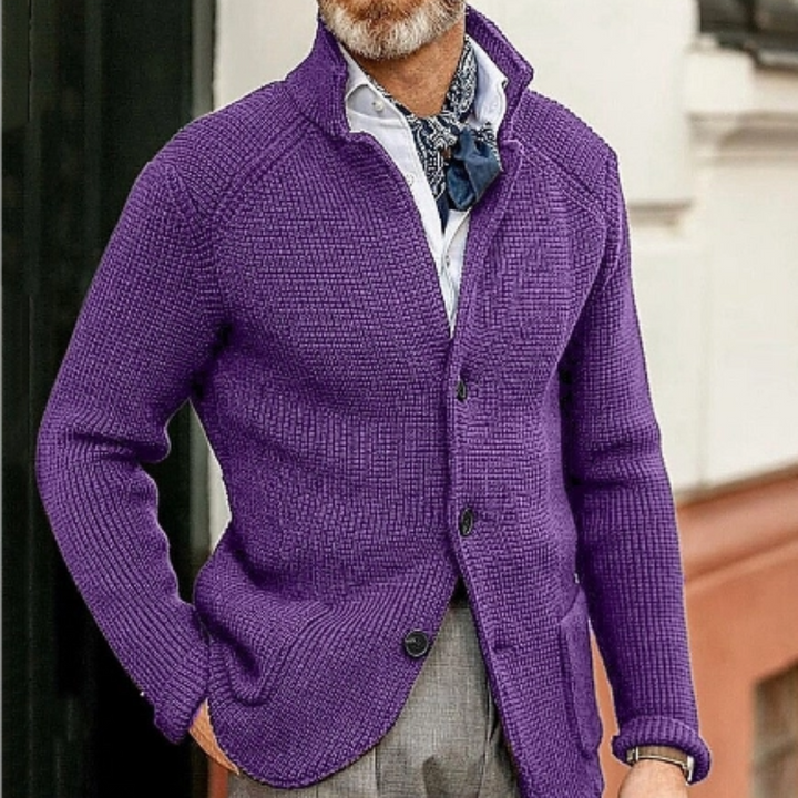 Detailed view of the buttons on a warm men's classic knit cardigan, perfect for winter.