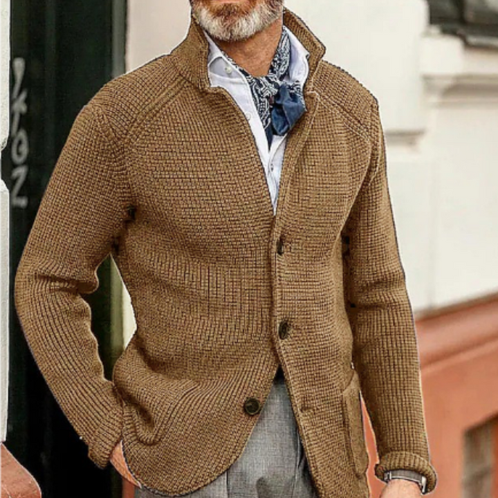 Side profile of a man wearing a cozy button-up cardigan, excellent for layering and warmth.
