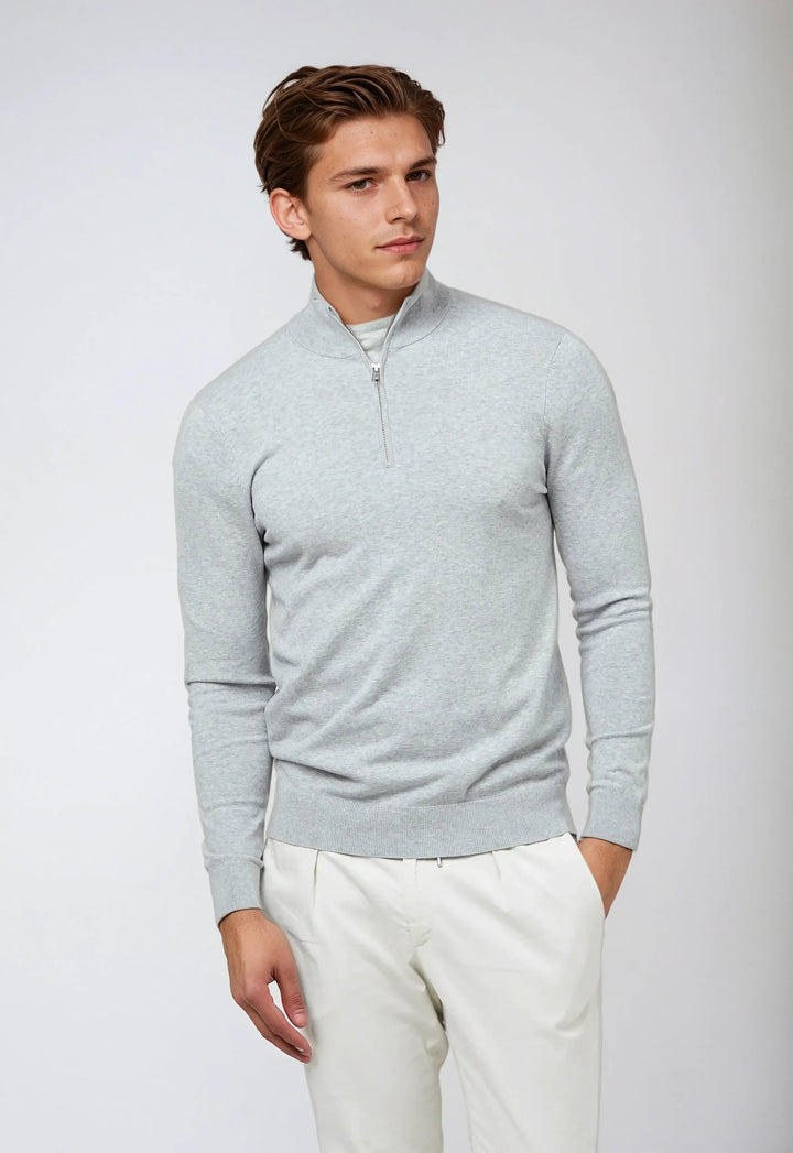 Man wearing a black half-zip pullover sweatshirt, ideal for fall casual wear.