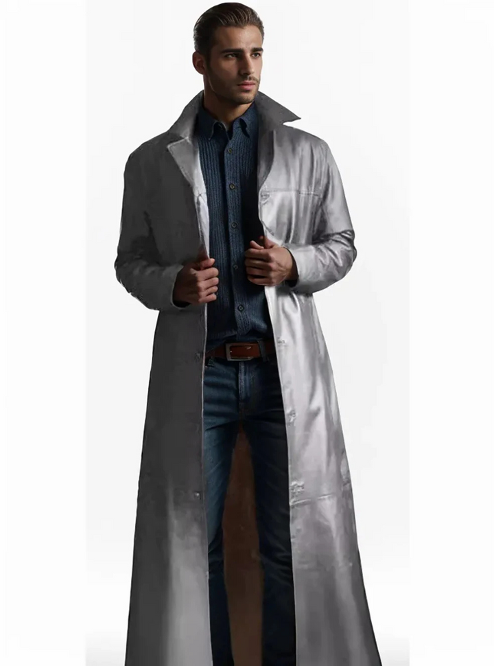 A man standing confidently in a classic longline trench coat, showcasing its elegant fit.
