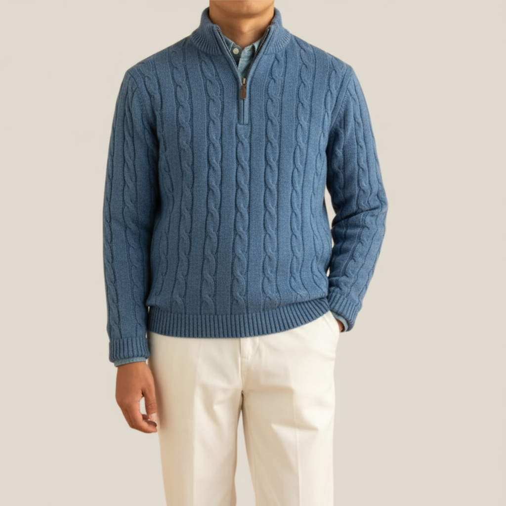 Close-up of a men's cable knit half zip sweater, showcasing texture & long sleeve detail.
