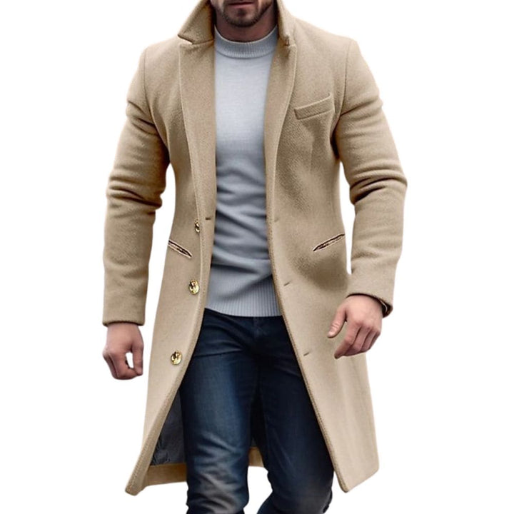 Stylish men's mid-length navy blue winter trench coat, ideal for formal fashion and warmth