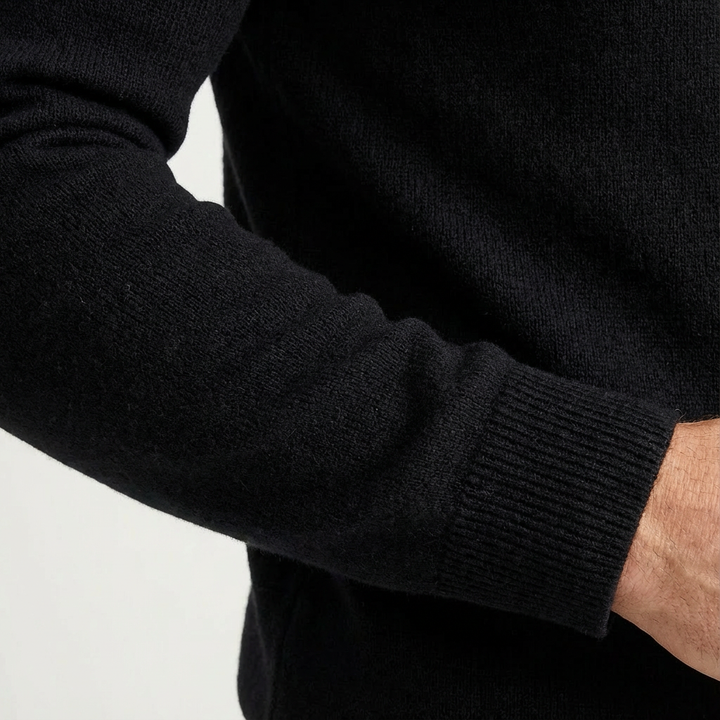 Comfortable men's knit quarter-zip pullover sweater, a classic long-sleeve design for versatile styling.