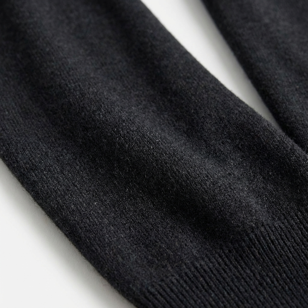 Versatile men's zip-neck sweater for smart-casual layering; a timeless classic for everyday comfort & style.