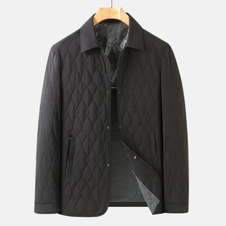 Durable men's quilted button-down jacket, a lightweight and classic outerwear piece for fall and spring casual fashion.