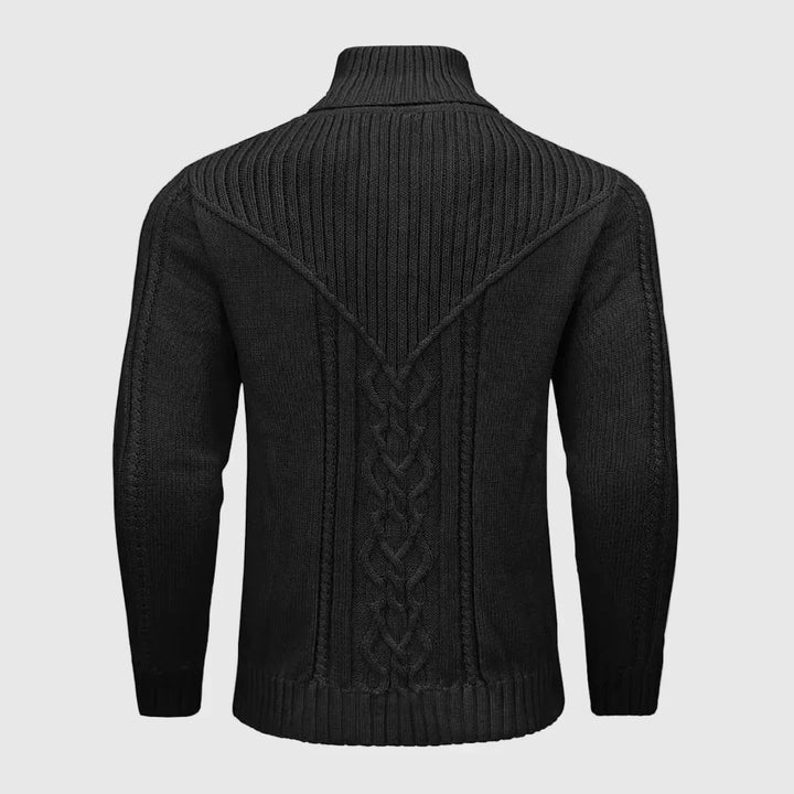 Close-up of a men's button-up cable knit jumper with an elegant shawl collar, highlighting its design.