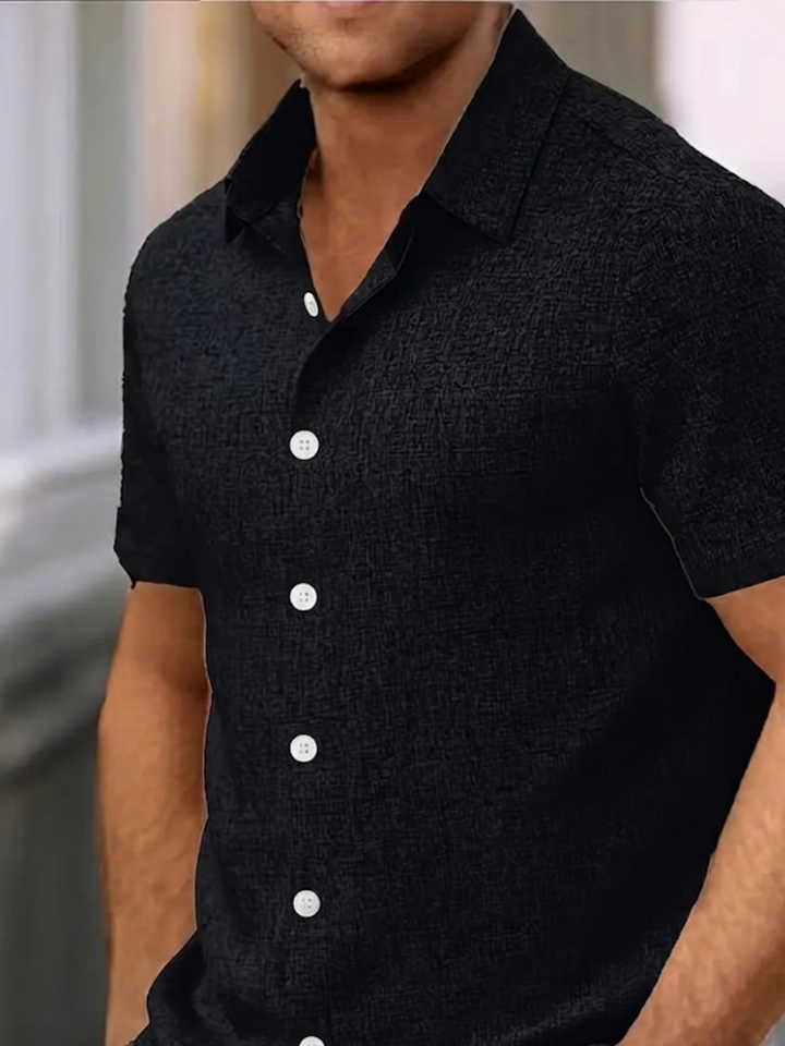 Classic men's short sleeve summer shirt, a comfortable and stylish addition to any wardrobe.