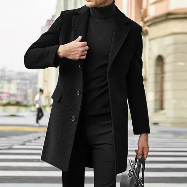 Man wearing a classic single-breasted long overcoat, a versatile men's winter outerwear for any look.
