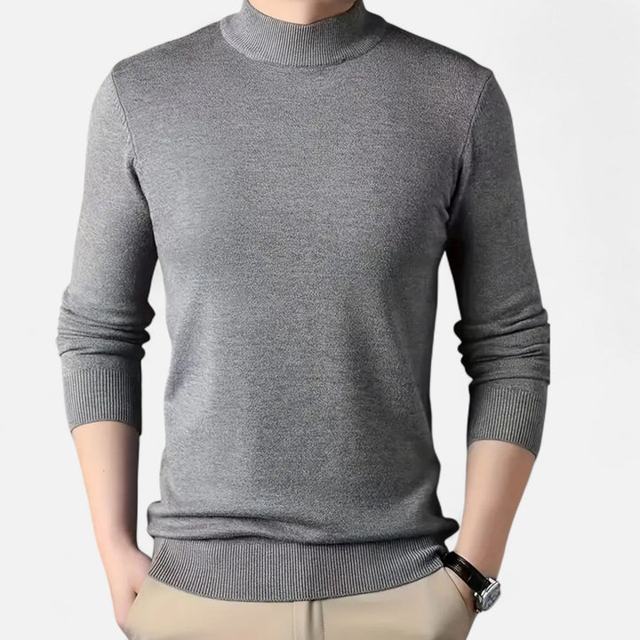 Elegant men's stand-collar long-sleeve sweater, a classic warm top for stylish autumn and winter layering.