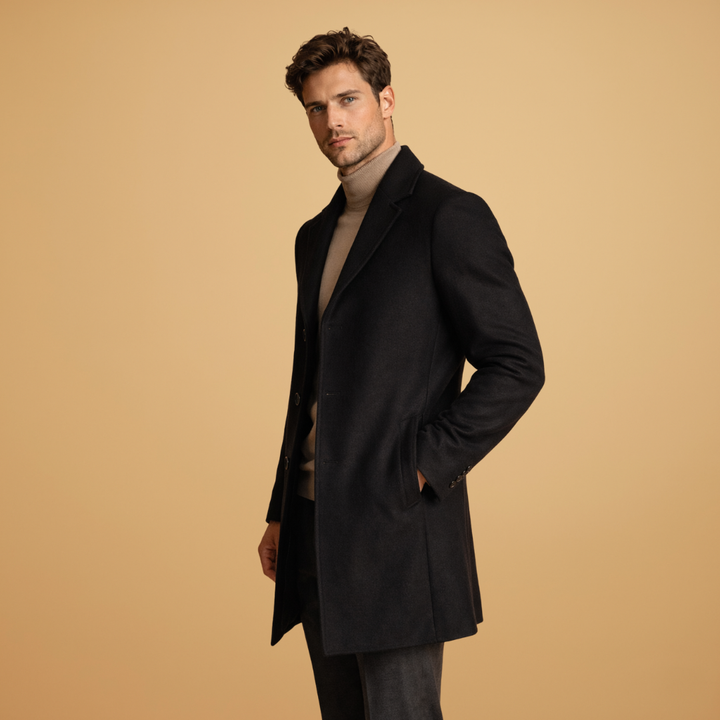 Stylish men's button-up tailored overcoat. Essential formal wear & business attire outerwear.