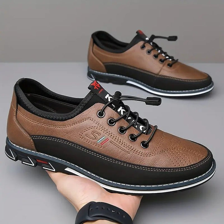 Classic black men's Oxford shoes in PU leather, designed for comfort and a polished, professional look.