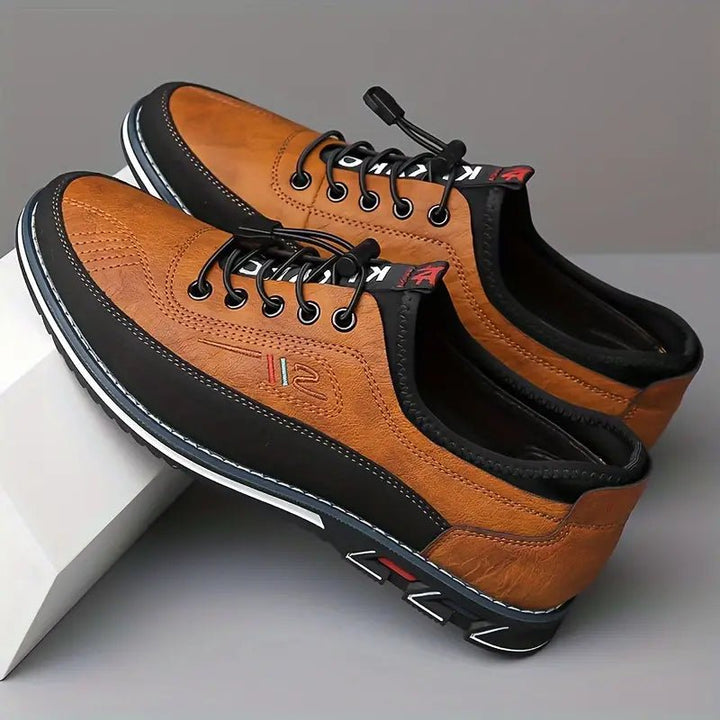 Dark brown men's classic Oxford dress shoes, providing comfort and style for any formal occasion.