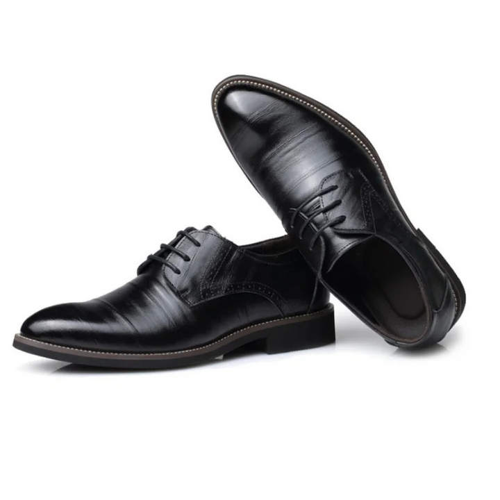 Detail of the lace-up closure on classic men's vegan leather oxford dress shoes, eco-friendly