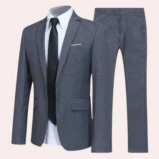 Sharp navy men's two-piece suit featuring a stylish notch lapel, ideal for business wear and formal occasions.