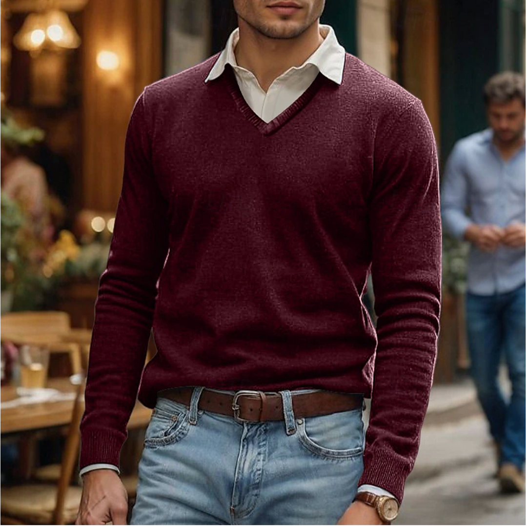 Soft knit men's V-neck sweater with long sleeves, ideal for comfortable casual wear and smart layering in cold weather.