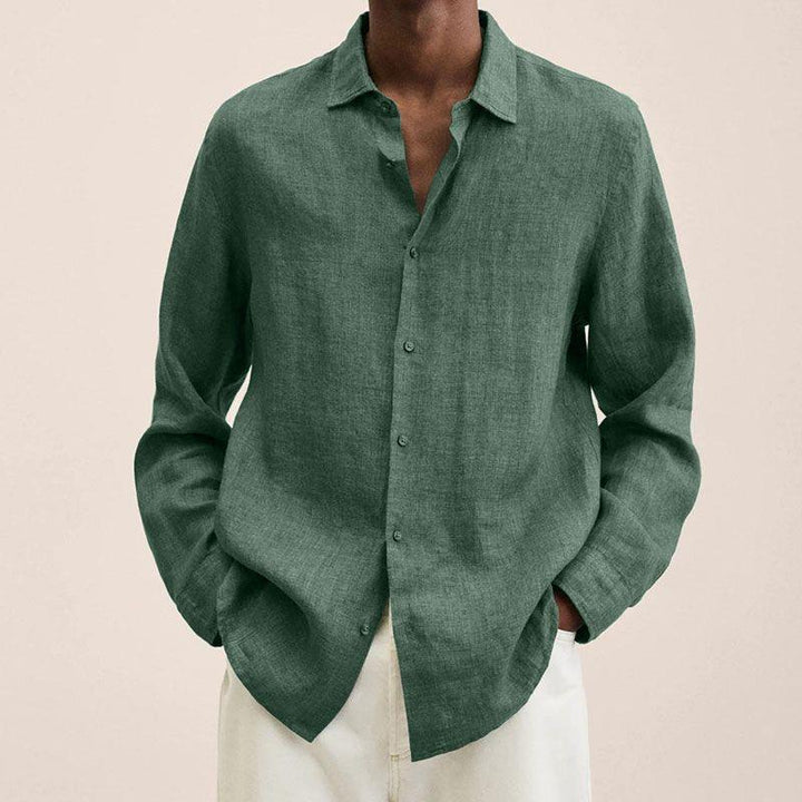 Relaxed fit men's button down shirt in a subtle striped pattern, breathable and casual long sleeve.