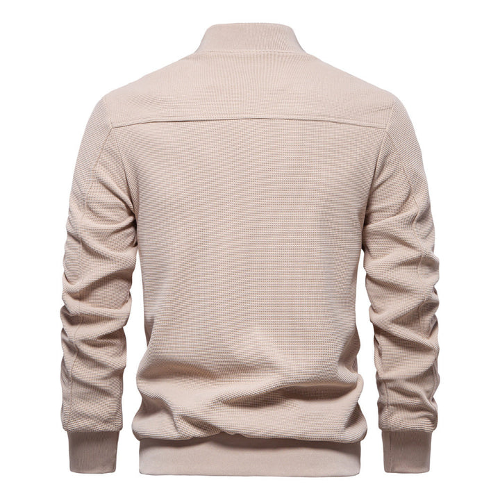 Modern men's bomber jacket, a versatile zip-up outerwear piece for stylish casual looks in fall and winter.
