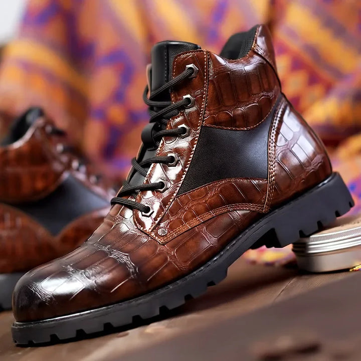 Lace-up men's ankle combat boots, black alligator embossed, featuring a durable lug sole for rugged fashion.