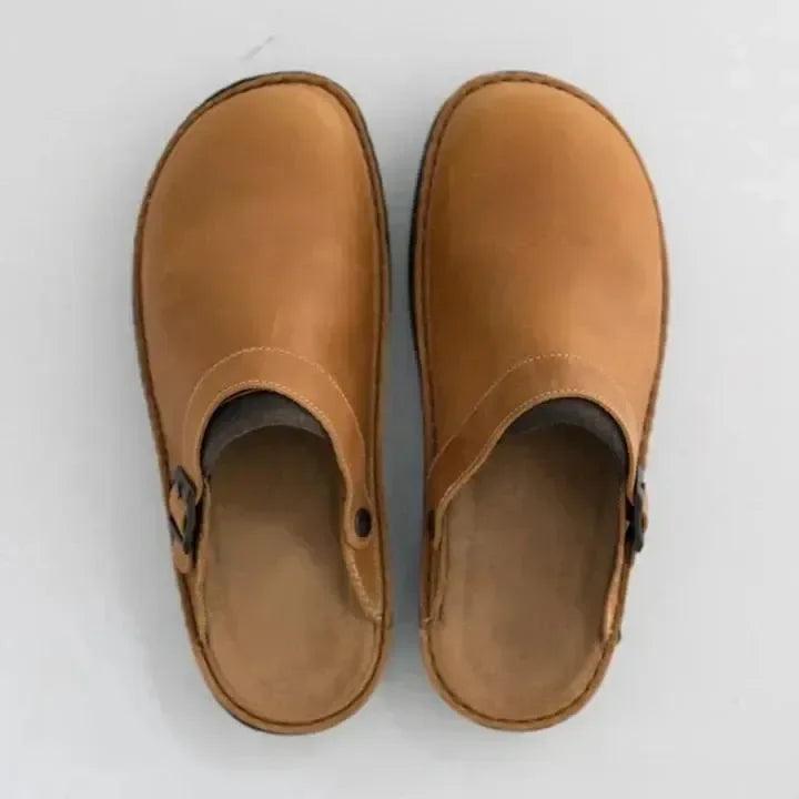 Versatile men's everyday slippers, providing cushioned comfort & essential support for casual use.