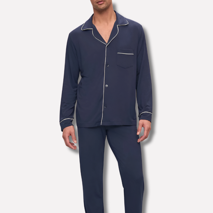 Men's comfortable blue cotton pajama set with long sleeve top, button closure, and side pockets. Ideal loungewear.