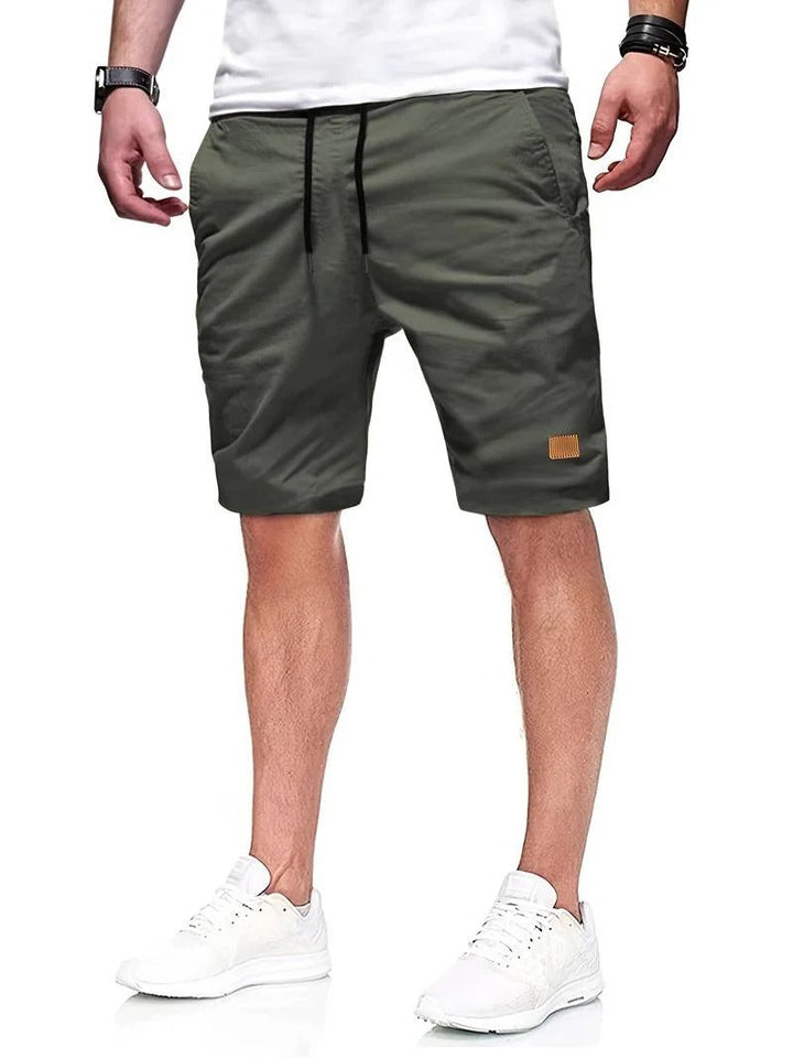 Casual men's drawstring shorts, perfect for summer, vacation, or comfortable lounge style.