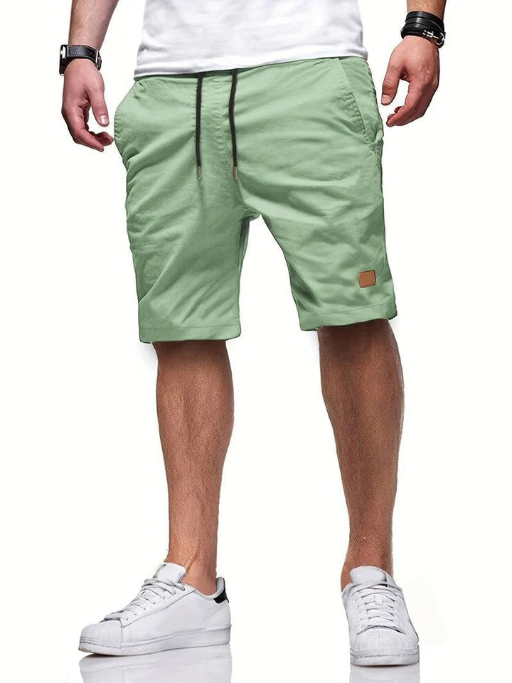 Comfortable men's drawstring shorts for athletic activities, lounge, or casual summer wear.