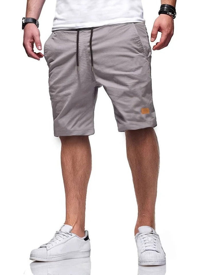 Relaxed fit men's comfortable drawstring shorts, great for versatile summer everyday style.