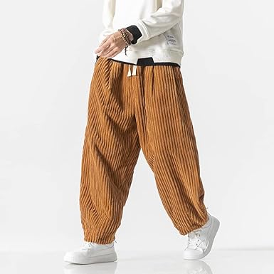 Relaxed fit men's everyday pants with adjustable drawstring waist & deep pockets, ideal for versatile comfort.