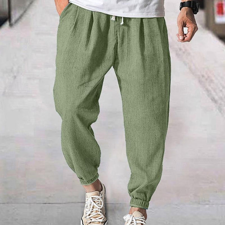 Men's comfortable grey jogging pants, perfect for athletic wear, lounging, or everyday casual style.