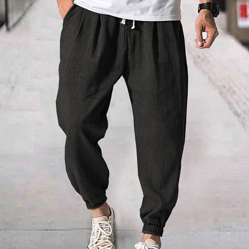 Versatile men's relaxed fit joggers in black, ideal for casual wear, workouts, and ultimate comfort.