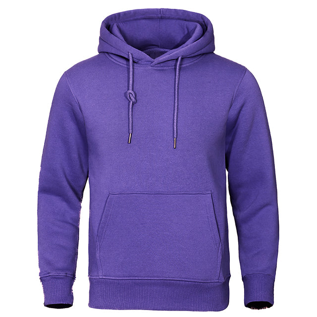 Model wearing a men's versatile pullover hoodie, ideal for streetwear and everyday comfort.
