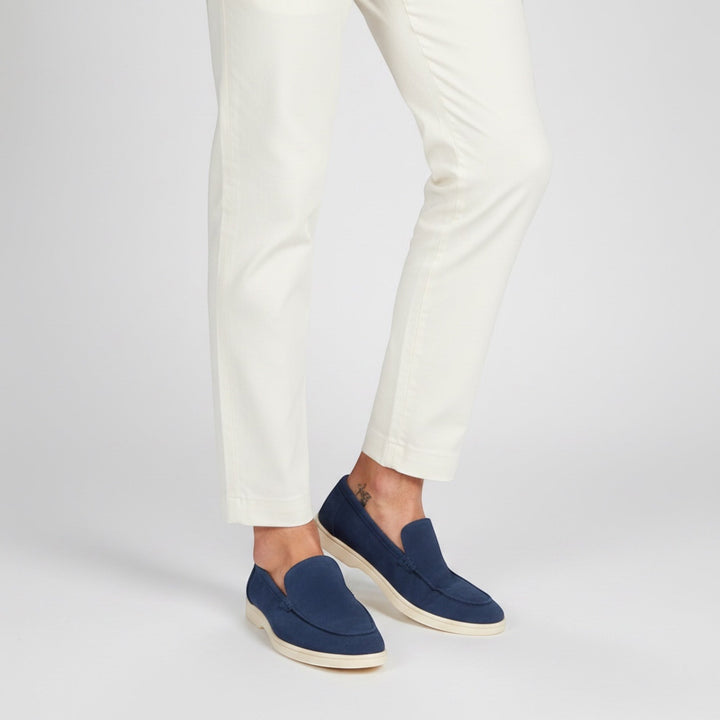 Smart casual men's slip-on loafers, a refined footwear choice for summer fashion and comfort.