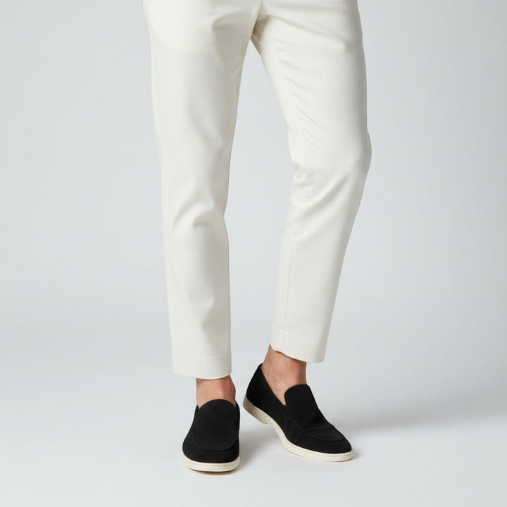 High-quality men's slip-on loafers, showcasing detailed craftsmanship and summer comfort.