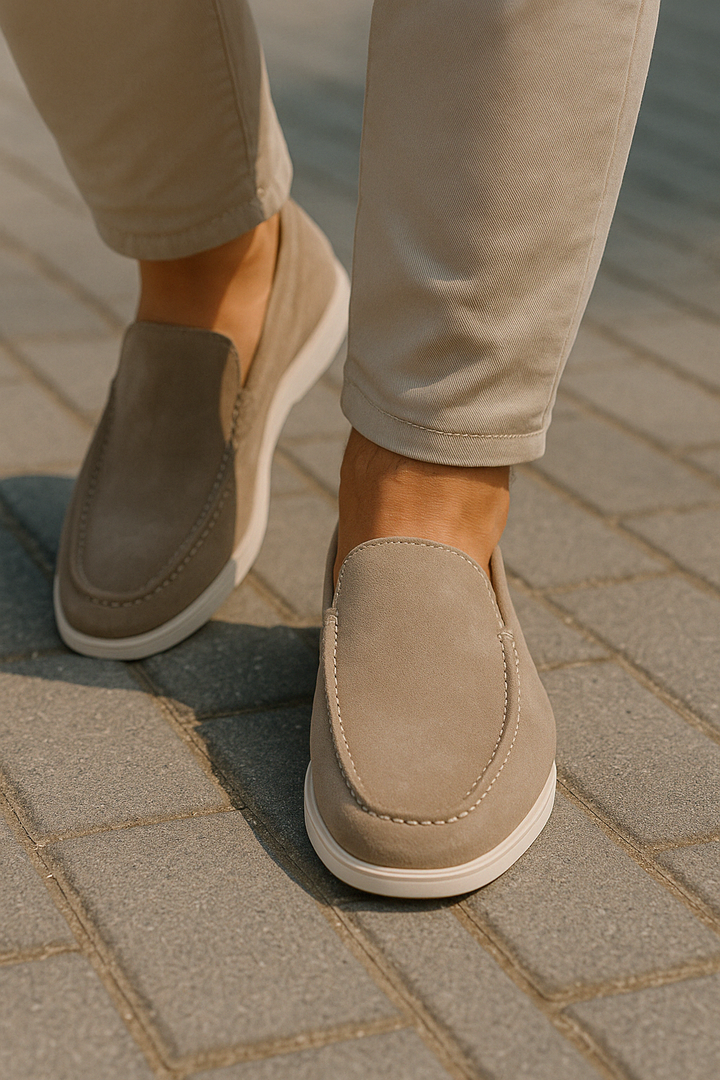 Comfortable men's slip-on loafers, ideal for all-day wear with a flat sole and classic round toe design.