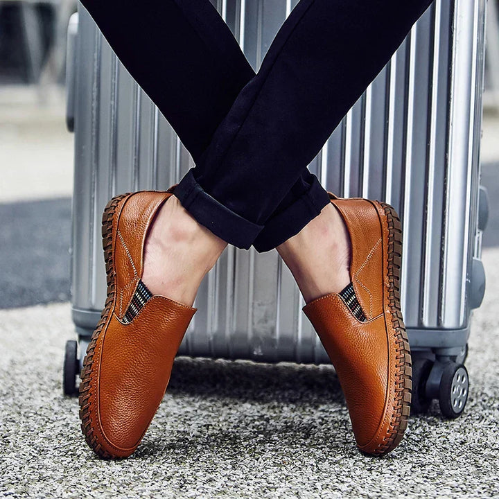 Stylish men's slip-on walking shoes with flexible sole for everyday comfort & easy wear.