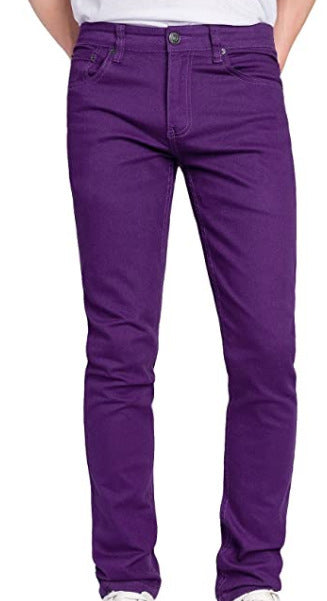 Man models comfortable men's summer chino pants with elastic waist in a stylish pose.