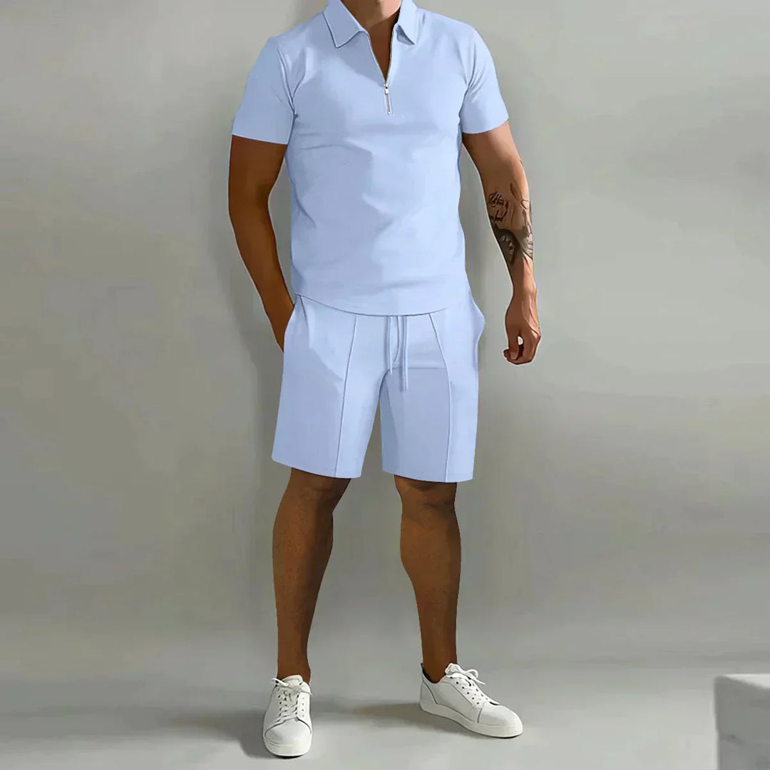 Stylish men's two-piece zip polo shirt & shorts set. Versatile for casual outings and relaxed wear.