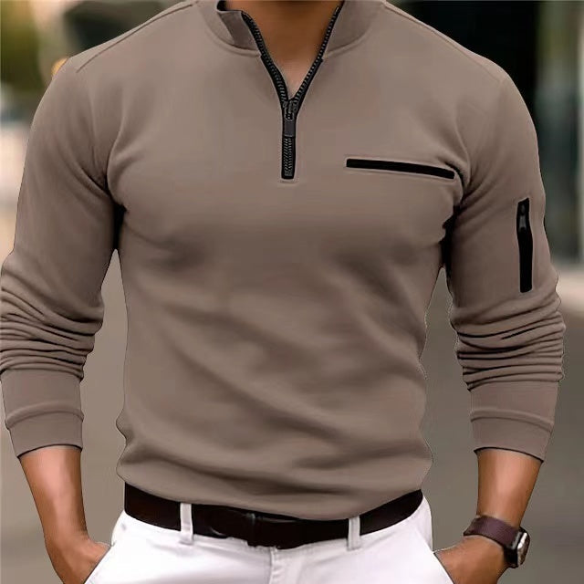 Modern men's comfortable zip-up sweater, designed for versatile wear with convenient hand pockets.