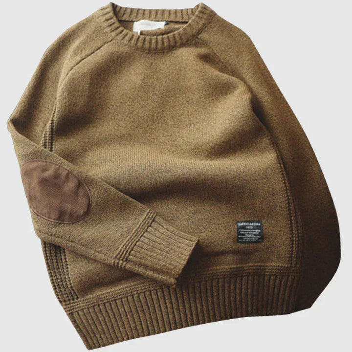 Casual men's alpine style knit sweater in a rich wool blend, suitable for cold weather.