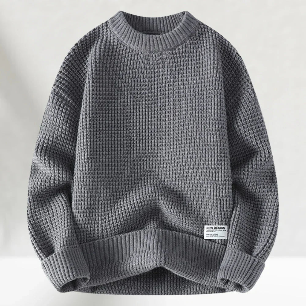 Textured men's pullover sweater with a cozy crew neck, ideal for warm winter casual menswear.